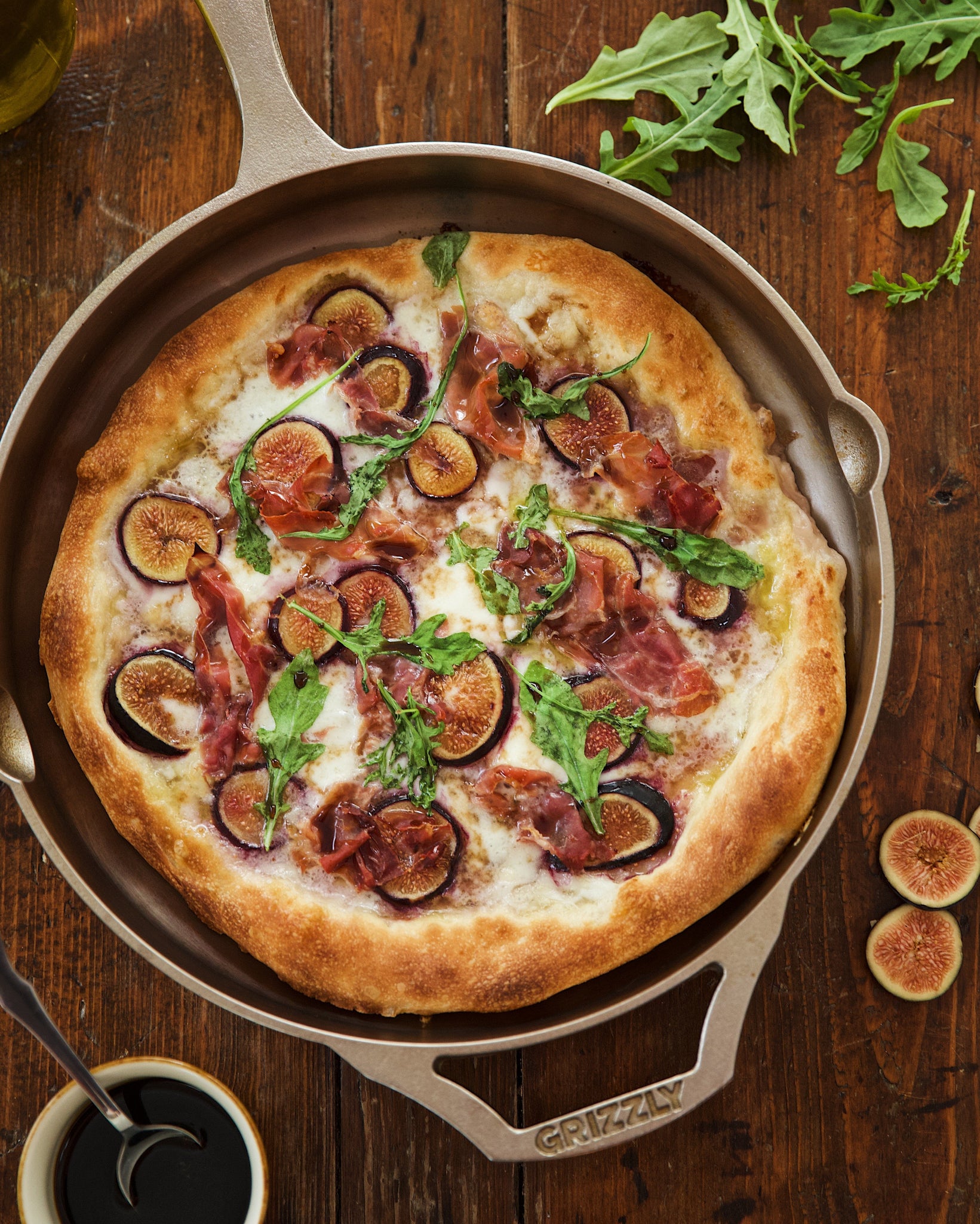 Fig and Prosciutto Pan Pizza featuring GRIZZLY Cookware's 12 inch cast iron skillet. 
